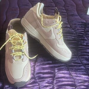 Nike Air Force Cream Sneakers with Yellow Accents